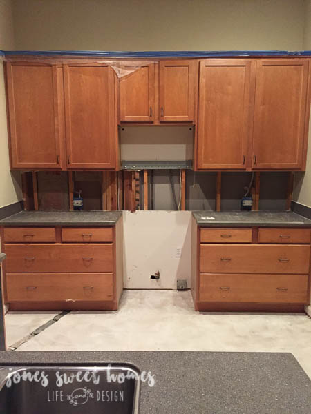 diy-kitchen-renovation-granite-white-cabinets-glass-backsplash-50